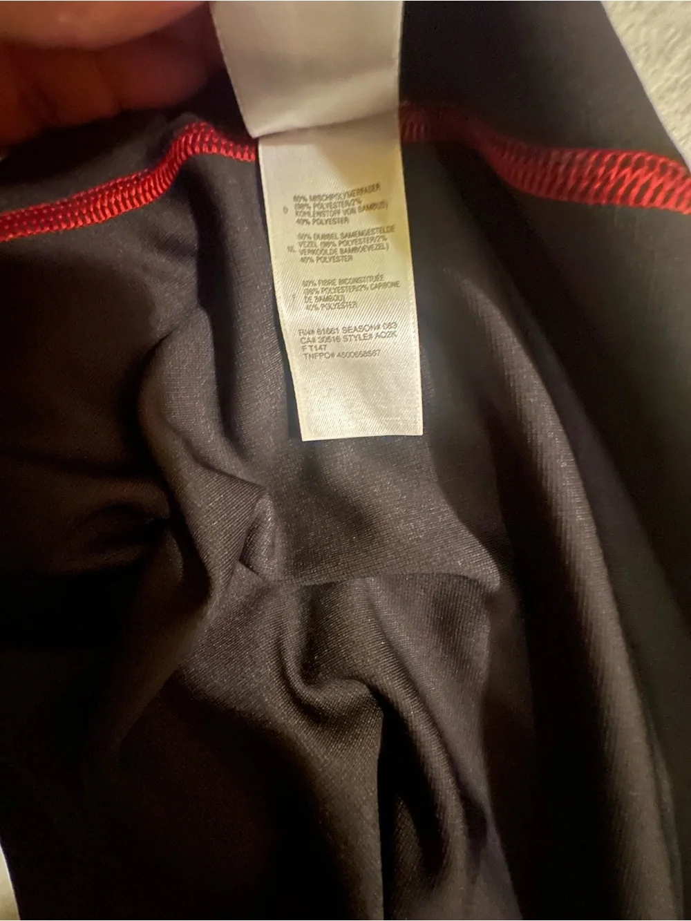 The North Face Men’s Black Half-Zip Performance Jacket with Red Accents